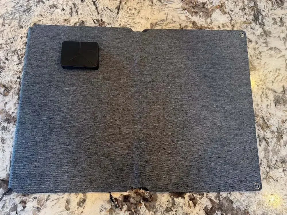 Portable Solar Panel Charger with Integrated Power Bank and Multi-Port Output